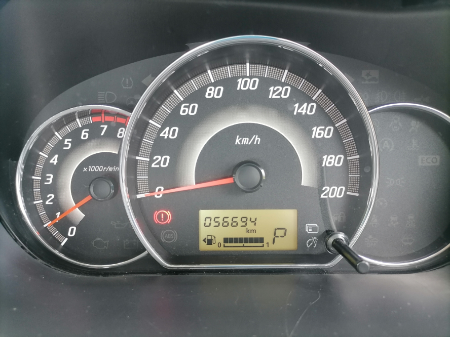 A vehicle's odometer, showing it has 56,694 miles on it.