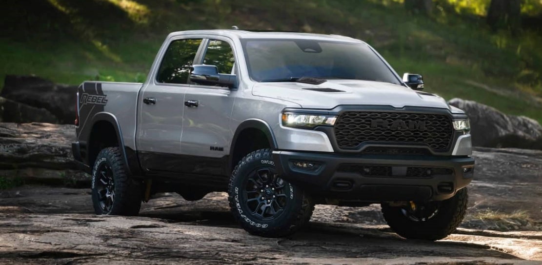 2026 RAM 1500 parked on a dry riverbed