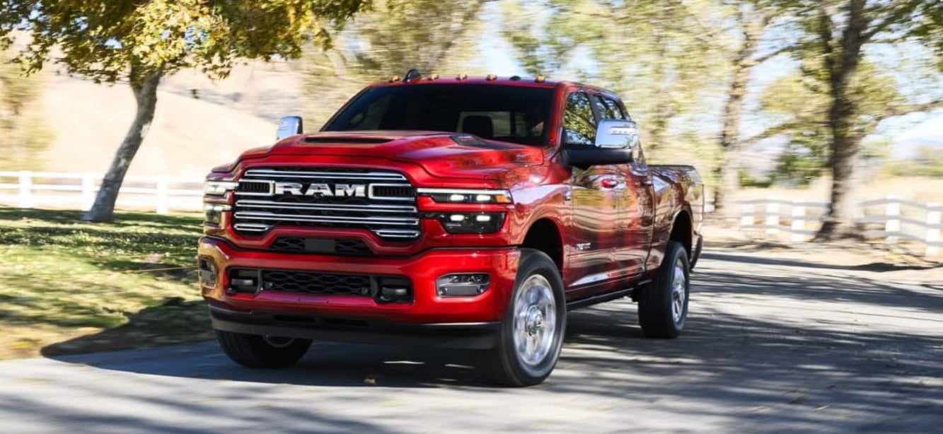 2026 RAM 2500 driving on a curvy driveway